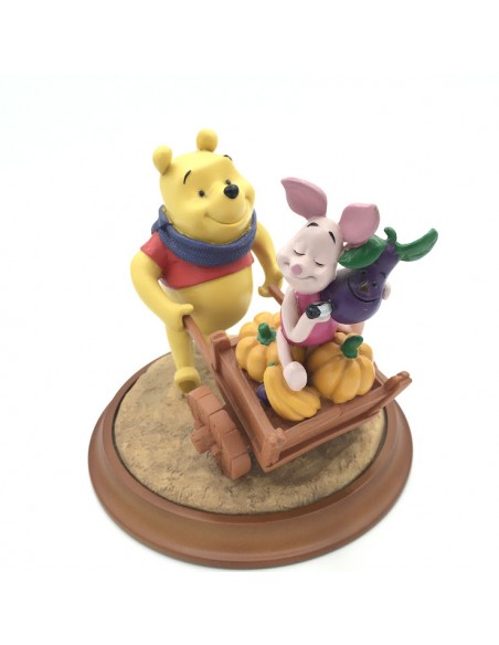 FIGURA WINNIE THE POOH CON PIGLET EN CARRETILLA